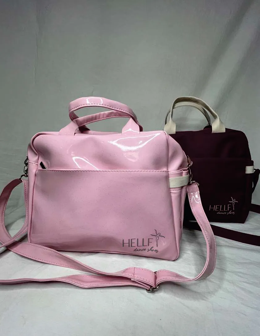 Bolsas de dança em verniz rosa e preto, com alça de mão e alça transversal.